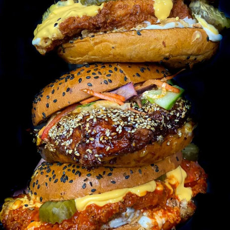 A tall stacked chicken burger